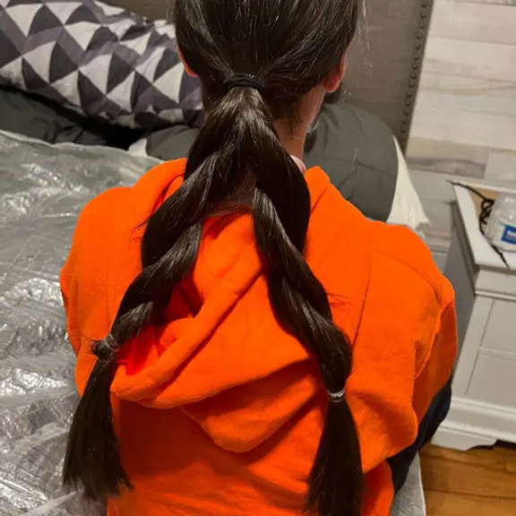 Photo of woman with double braid