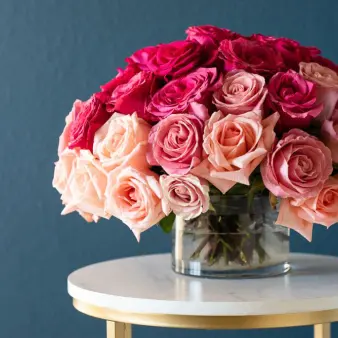 A bouquet of roses in a clear vase.