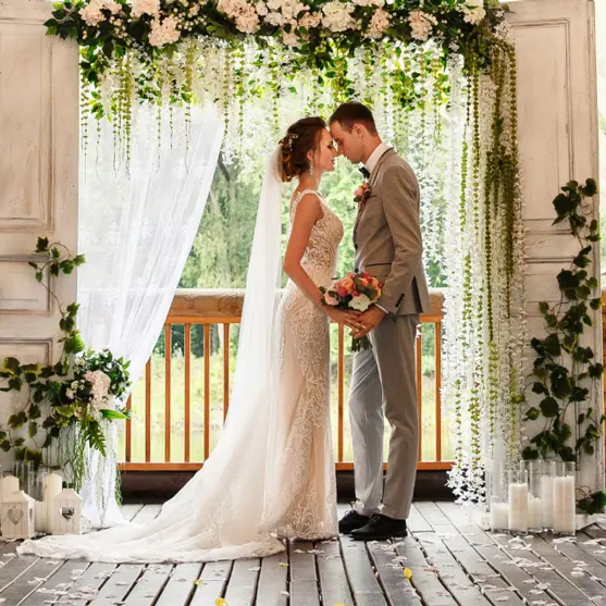 Wedding couple standing in doorway